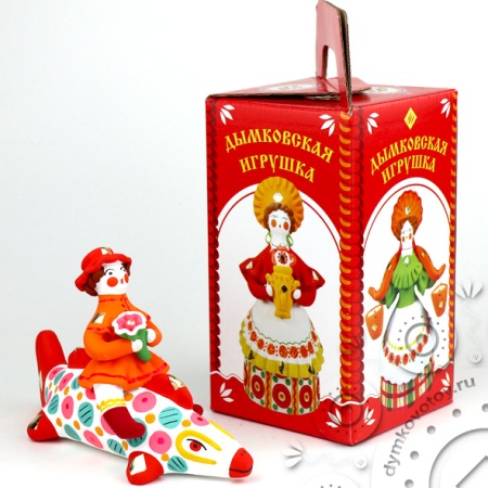 Всадница на рыбе с цветком